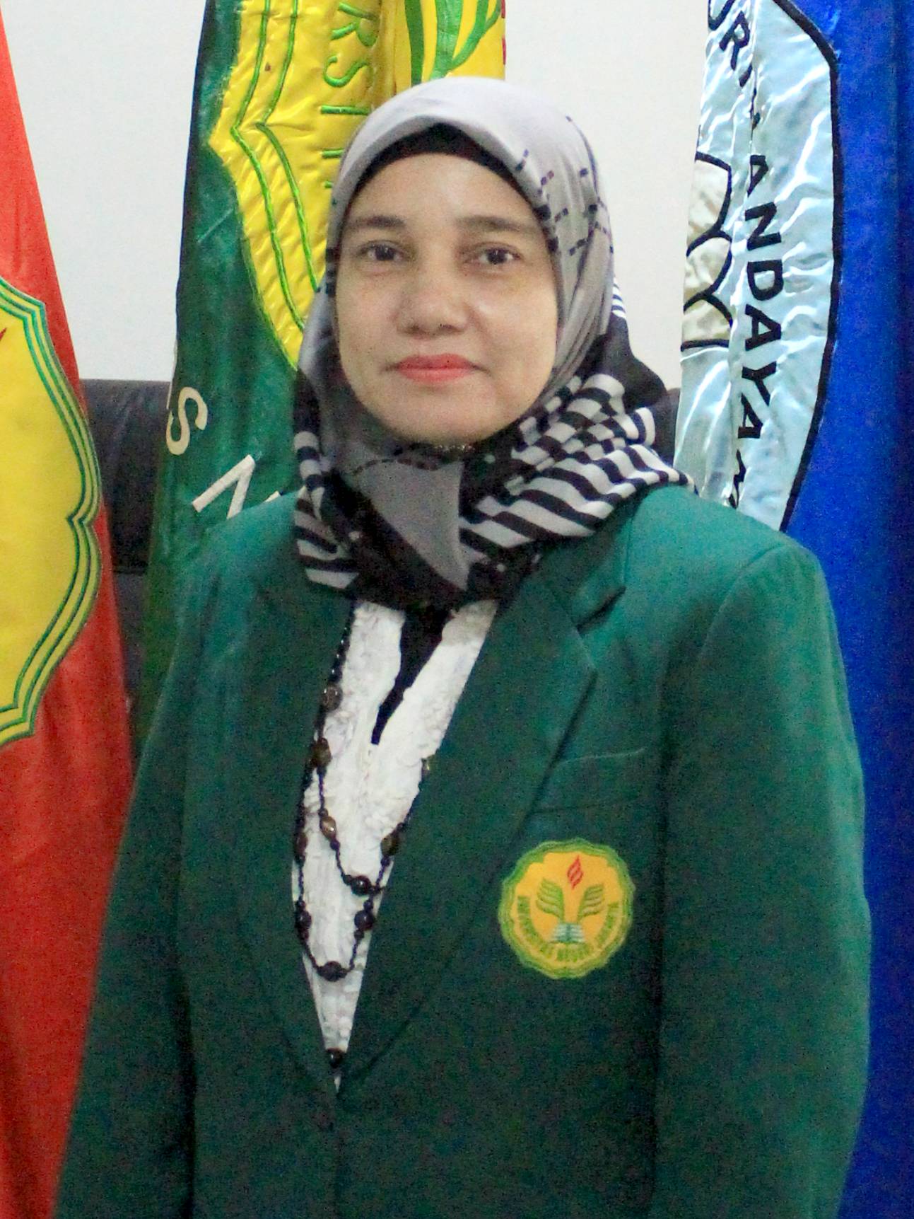 Dr. Kurniawati, M.Si